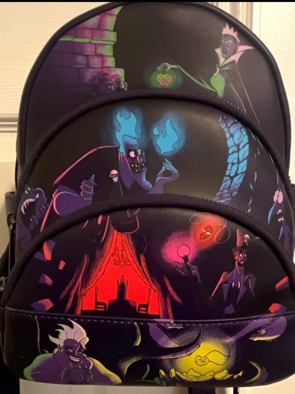 Loungefly Black Haunted Villains Mini Backpack with Neon Accents